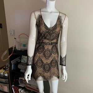 Nude and black lace dress